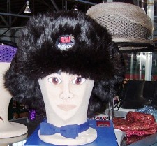 Black Russian Fur Hat. Earflaps shown tied up